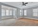 Bright, spacious bedroom with large windows and neutral carpet at 326 Brownstones Ne Cir, Atlanta, GA 30312