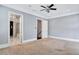 Spacious bedroom with views of ensuite bathroom and walk-in closet at 326 Brownstones Ne Cir, Atlanta, GA 30312
