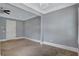 Bright, carpeted bedroom with neutral paint and ceiling fan at 326 Brownstones Ne Cir, Atlanta, GA 30312