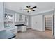 Bright and airy office space with built-in desk, cabinets, and Murphy bed at 326 Brownstones Ne Cir, Atlanta, GA 30312