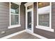 This charming outdoor patio features wood flooring and views of the surrounding landscape and property at 326 Brownstones Ne Cir, Atlanta, GA 30312