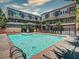 Community pool with seating and lounging offers a refreshing neighborhood amenity at 326 Brownstones Ne Cir, Atlanta, GA 30312