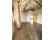 Open living room featuring concrete floors, high ceilings, and lots of natural light at 395 Central Park Ne Pl # 610, Atlanta, GA 30312