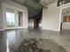 Expansive living room featuring concrete floors, high ceilings, and large windows for lots of natural light at 395 Central Park Ne Pl # 610, Atlanta, GA 30312
