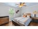 Bedroom with hardwood floors, side tables and decor at 3190 Red Rose Dr, Powder Springs, GA 30127