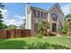 Charming brick home with a well-manicured front lawn and mature landscaping at 3190 Red Rose Dr, Powder Springs, GA 30127