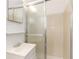 Cozy bathroom featuring a glass enclosed shower and vanity at 4149 Indian Lake Cir, Stone Mountain, GA 30083