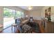 Living room with a large window overlooking the backyard and modern furniture at 4149 Indian Lake Cir, Stone Mountain, GA 30083