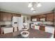 Inviting kitchen features dark cabinets, granite counters, and modern appliances at 5900 Union Woods Way, Union City, GA 30291