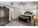 Spacious main bedroom with wood floors, high ceilings, and elegant furnishings at 5900 Union Woods Way, Union City, GA 30291