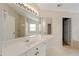 Bathroom with long vanity with a large mirror and drawers for storage at 773 Van Briggle Path, Sugar Hill, GA 30518
