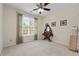 Bright bedroom featuring neutral carpet and a decorative wood vanity at 773 Van Briggle Path, Sugar Hill, GA 30518