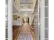 Inviting foyer with hardwood floors, a soaring ceiling, and elegant details at 773 Van Briggle Path, Sugar Hill, GA 30518