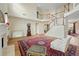 Open-concept living area featuring hardwood floors, tall ceilings, and lots of natural light at 773 Van Briggle Path, Sugar Hill, GA 30518