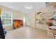 Bright storage room with tile flooring, ample shelving, and a door to the outside at 773 Van Briggle Path, Sugar Hill, GA 30518