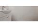 Bathroom with white basin style sink and cabinets at 161 Stoneforest Dr, Woodstock, GA 30189