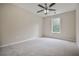 Bedroom featuring a window and ceiling fan at 161 Stoneforest Dr, Woodstock, GA 30189
