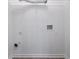 Empty laundry room with shelving and hookups ready for appliances at 161 Stoneforest Dr, Woodstock, GA 30189