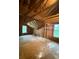 Spacious unfinished attic space with exposed beams and insulation, offering potential for customization at 101 Dancing Fox Rd, Decatur, GA 30032