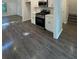 Modern kitchen featuring white cabinets, quartz countertops, and stainless steel appliances at 101 Dancing Fox Rd, Decatur, GA 30032