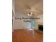 Inviting living room showcases hardwood floors, a vaulted ceiling, and a brick fireplace at 169 Rachel Blvd, Temple, GA 30179