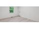 Bedroom features fresh paint, new flooring, and natural light creating a warm and inviting space at 4443 Flat Shoals Pkwy, Decatur, GA 30034