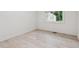 Cozy bedroom with neutral walls and new flooring creating a peaceful retreat at 4443 Flat Shoals Pkwy, Decatur, GA 30034