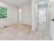 Bedroom featuring natural light, light wood floors, neutral colors, and trim at 4443 Flat Shoals Pkwy, Decatur, GA 30034