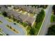 Aerial view of townhomes with easy access to parking and well-maintained landscapes at 4895 Sterling Close, Buford, GA 30518