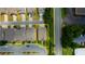 Aerial view of a townhome with a yellow outline, showcasing its location and surroundings at 4895 Sterling Close, Buford, GA 30518
