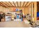 Unfinished basement area showing storage for clothing, toys, balls and other miscellaneous items at 4895 Sterling Close, Buford, GA 30518