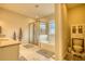Spacious bathroom with double sinks, granite countertops, and a walk-in shower at 4895 Sterling Close, Buford, GA 30518