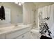 Well-lit bathroom featuring a decorative shower curtain and white vanity at 4895 Sterling Close, Buford, GA 30518