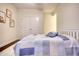 Comfortable bedroom featuring a cozy bed with attractive linens and natural light, complemented by neutral walls at 4895 Sterling Close, Buford, GA 30518