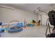 Garage featuring recreational equipment and toys, offering flexible space at 4895 Sterling Close, Buford, GA 30518
