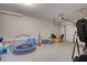 Spacious garage can be used for parking or other recreation like a trampoline, basketball, or other games at 4895 Sterling Close, Buford, GA 30518