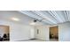 This spacious garage has plenty of room for a car and storage, and includes speckled floors for easy maintenance at 4895 Sterling Close, Buford, GA 30518
