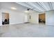 Spacious garage with painted floor and extra storage space at 4895 Sterling Close, Buford, GA 30518