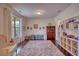 Bright playroom with hardwood floors, storage, natural light, and neutral paint at 4895 Sterling Close, Buford, GA 30518