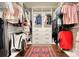 Organized walk-in closet with ample shelving and hanging space to maximize storage and convenience at 4895 Sterling Close, Buford, GA 30518