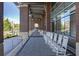 Spacious covered walkway with comfortable rocking chairs at 6175 Weatherly Dr, Sandy Springs, GA 30328