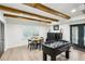 Spacious game room featuring a foosball table, seating, and stylish decor at 6175 Weatherly Dr, Sandy Springs, GA 30328