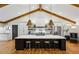 Spacious kitchen features a large island, marble counters, and stainless steel appliances at 6175 Weatherly Dr, Sandy Springs, GA 30328