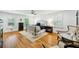Spacious main bedroom featuring hardwood floors, ample natural light, and comfortable seating at 6175 Weatherly Dr, Sandy Springs, GA 30328