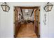 Inviting entryway boasts double doors, wood floors and a glimpse into the beautiful living room at 6175 Weatherly Nw Dr, Sandy Springs, GA 30328