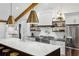 Kitchen view showcasing a spacious island, stainless steel appliances, and ample countertop space at 6175 Weatherly Nw Dr, Sandy Springs, GA 30328