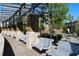 Relaxing community park space offering swinging benches and a view of the building at 6175 Weatherly Nw Dr, Sandy Springs, GA 30328