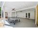 Covered patio area with ping pong table and access to the backyard at 6175 Weatherly Nw Dr, Sandy Springs, GA 30328