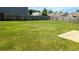 Spacious backyard with lush green grass, ideal for recreation and relaxation at 15 Regal Ln, Covington, GA 30016