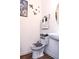 Clean and modern half bathroom features a stylish sink and decorative accents at 15 Regal Ln, Covington, GA 30016